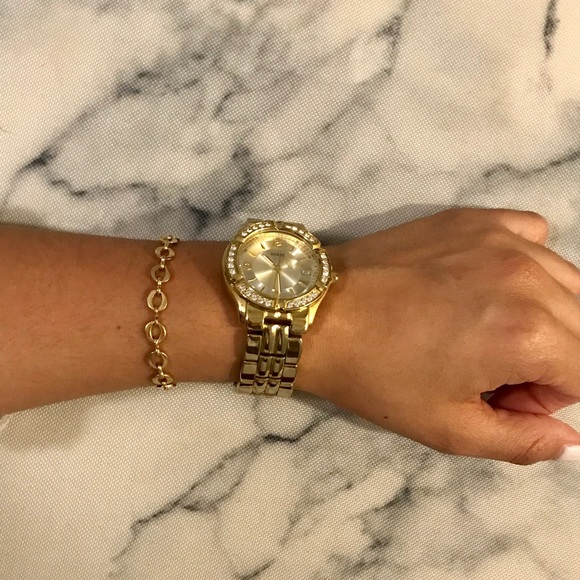 Guess Jewelry - Guess gold tone watch